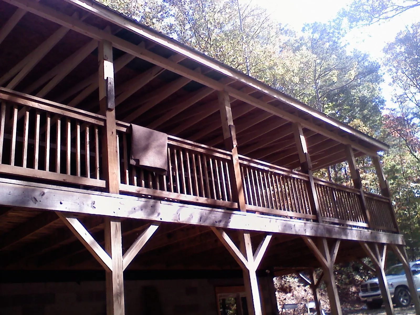 Timber framing under a new elevated porch and deck — Roof Leak Repair in Conestoga by Roofing Brothers